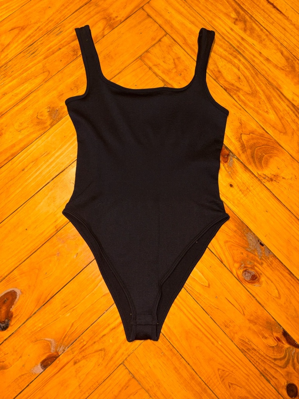 Classic Black Ribbed One-Piece Bodysuit